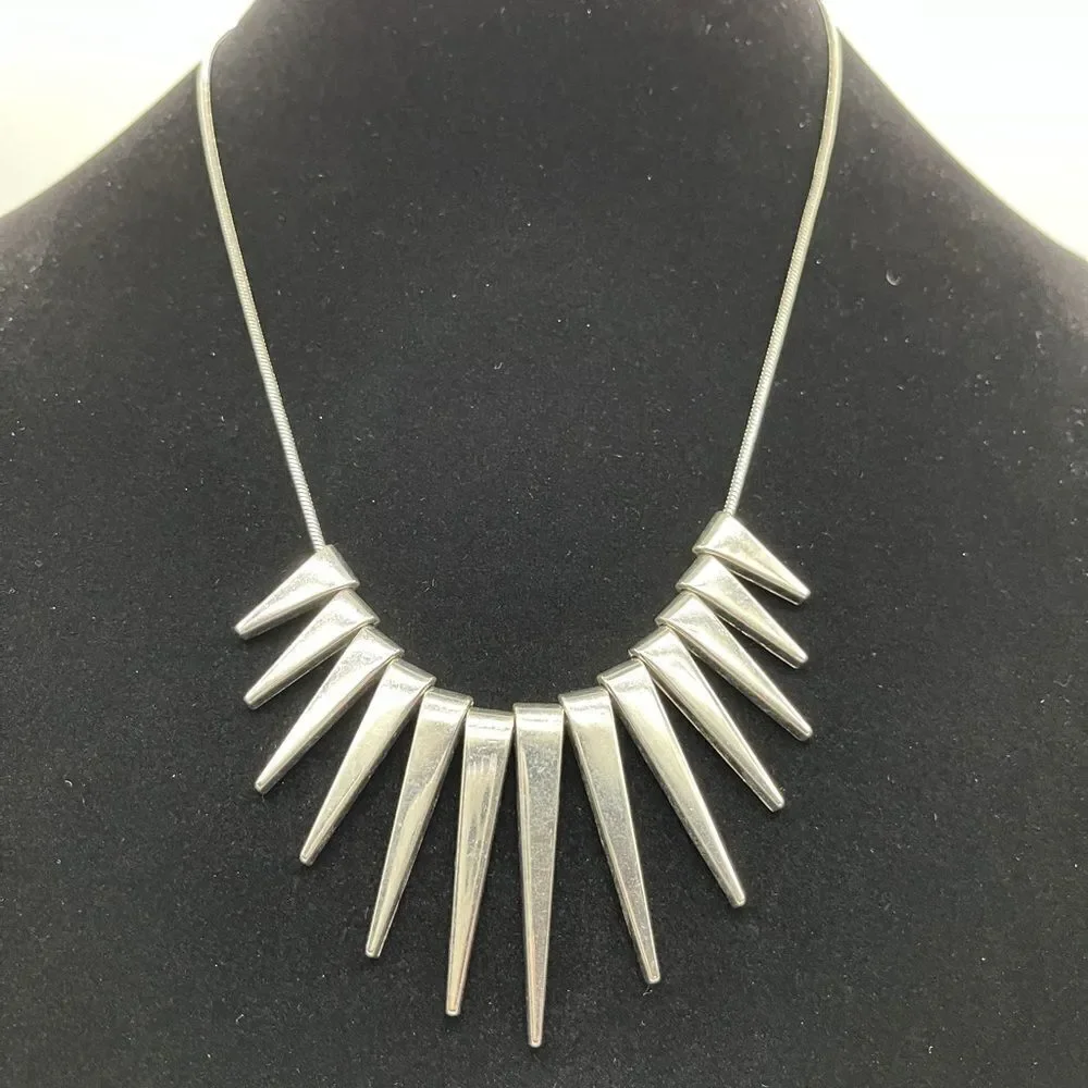 -Express Silver tone chain w/ triangle accents